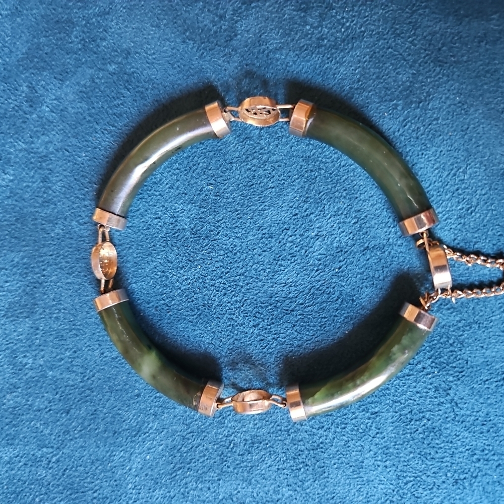 Elegant Green Bracelet with Gold Accents
